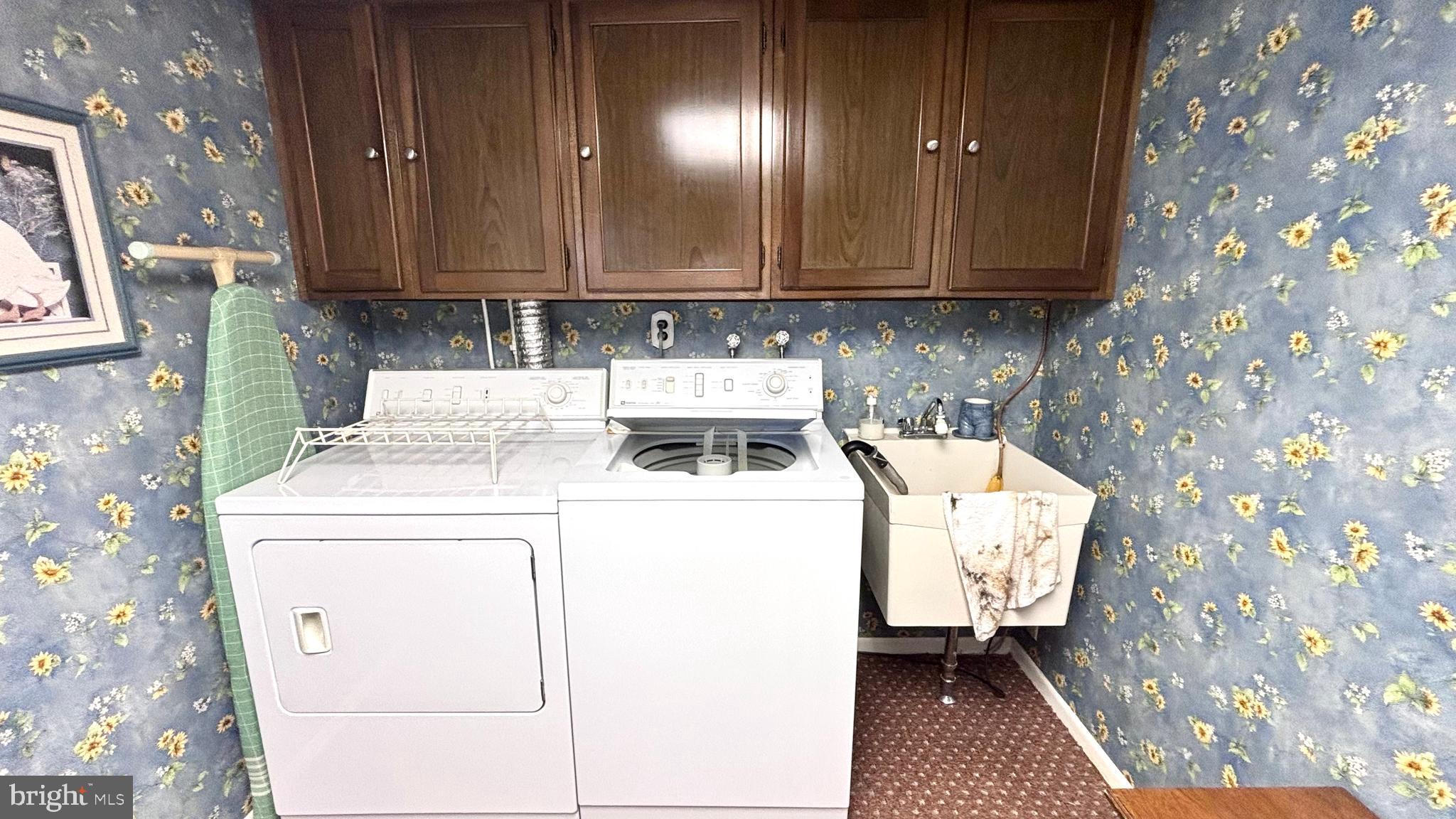 9401 Tulip Street Philadelphia, PA 19114 - Photo 37 of 67 a utility room with dryer and washer