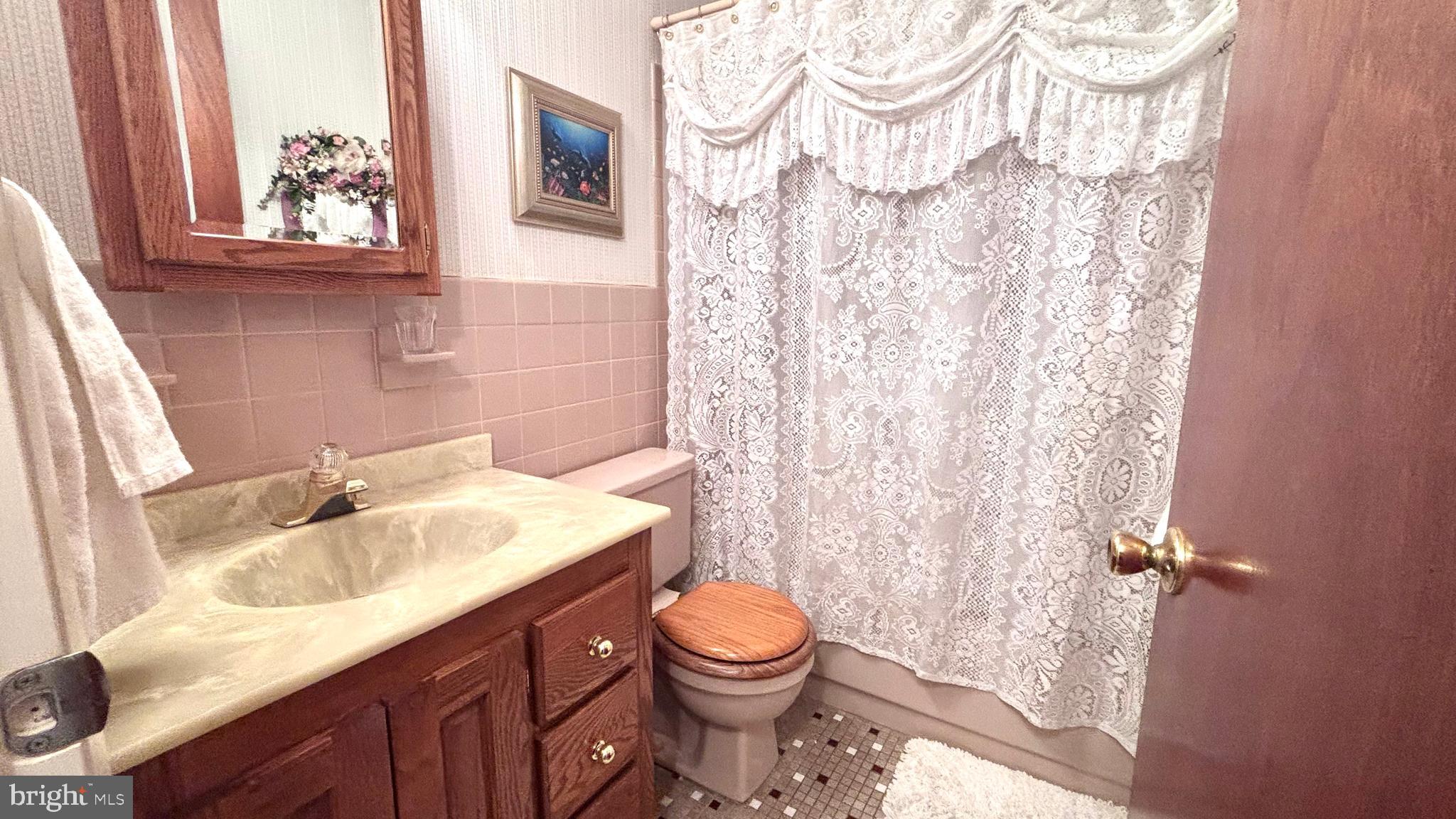 9401 Tulip Street Philadelphia, PA 19114 - Photo 44 of 67 a bathroom with a sink toilet and shower