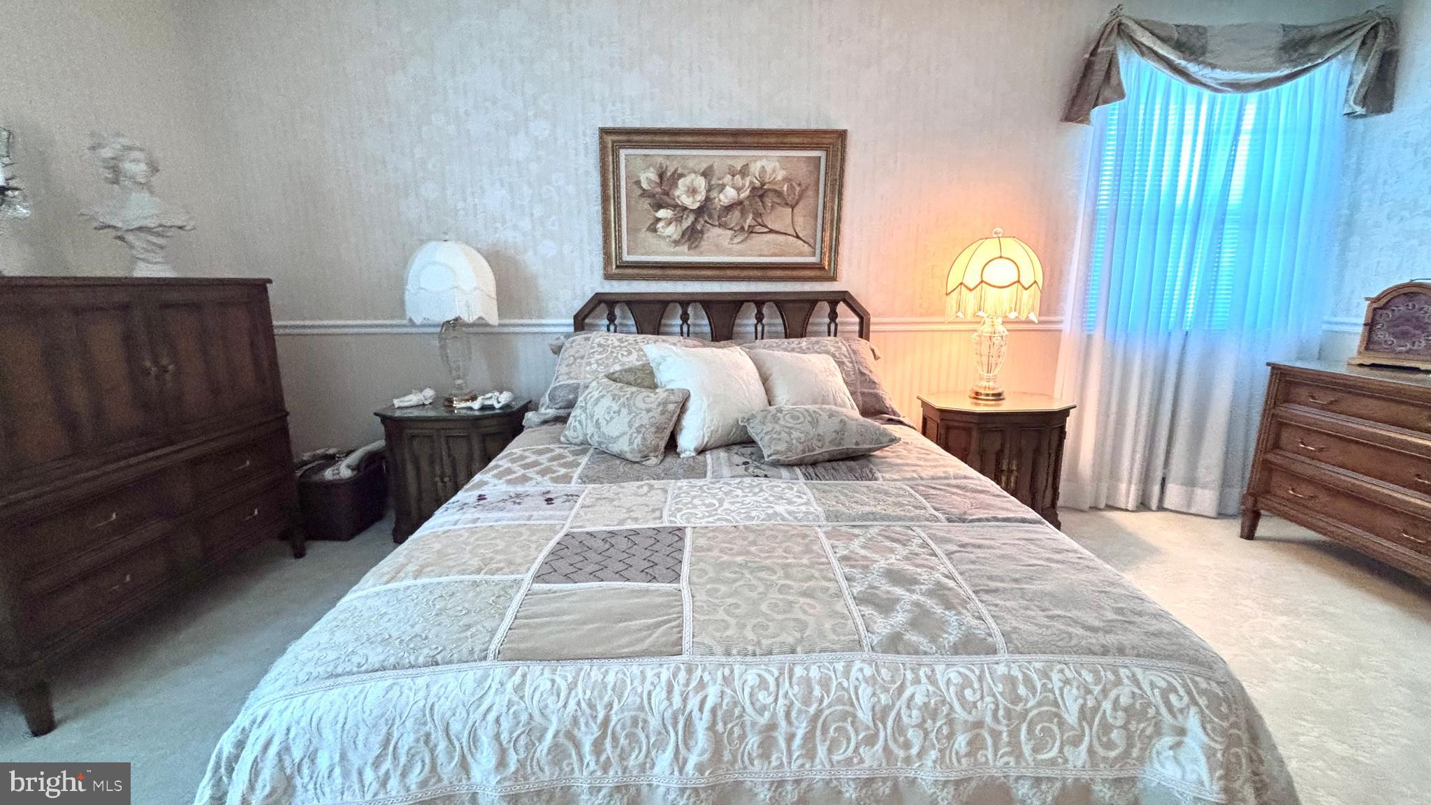 9401 Tulip Street Philadelphia, PA 19114 - Photo 46 of 67 a bedroom with a large bed and a dresser