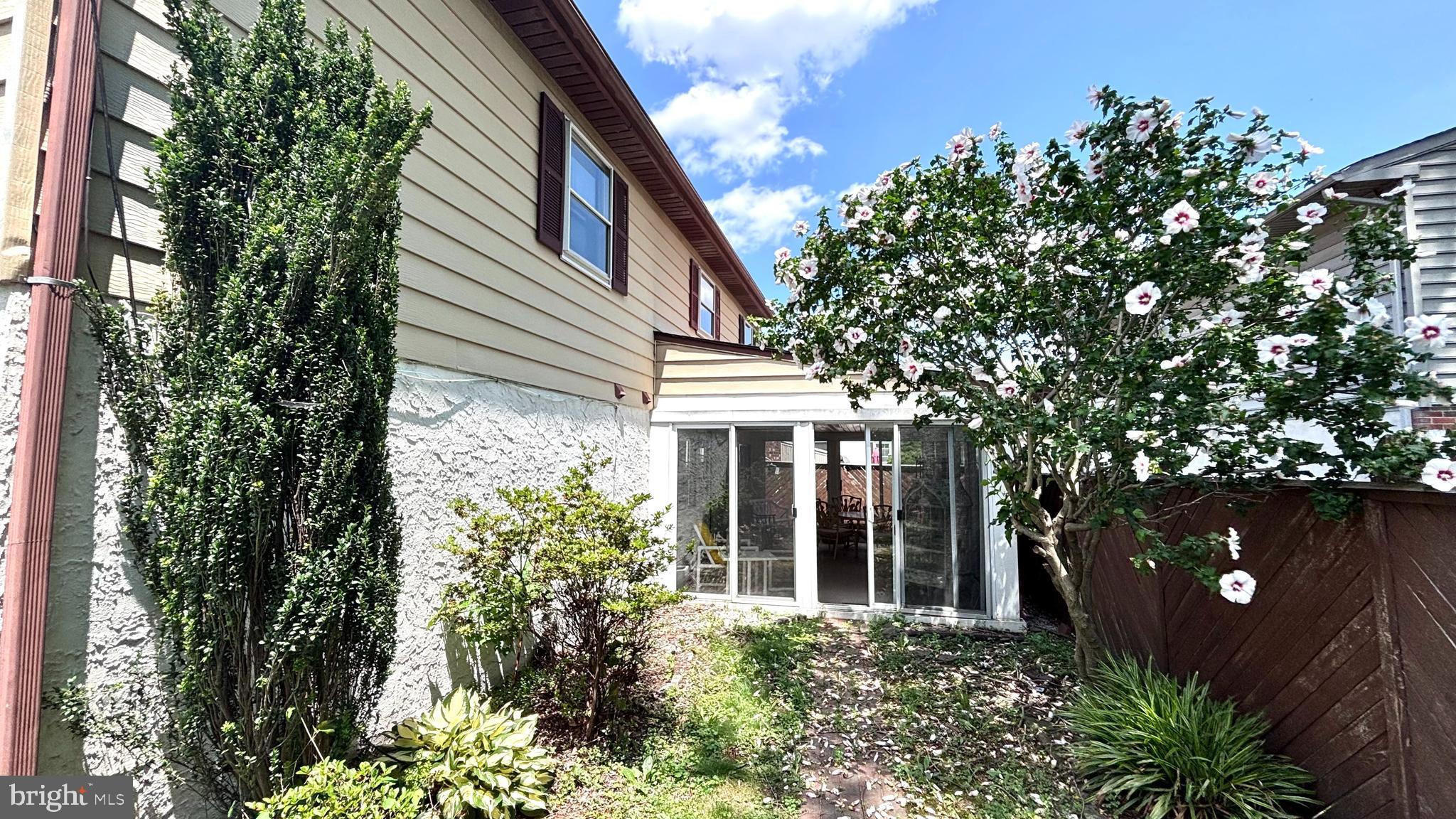 9401 Tulip Street Philadelphia, PA 19114 - Photo 67 of 67 front view of a house with a garden