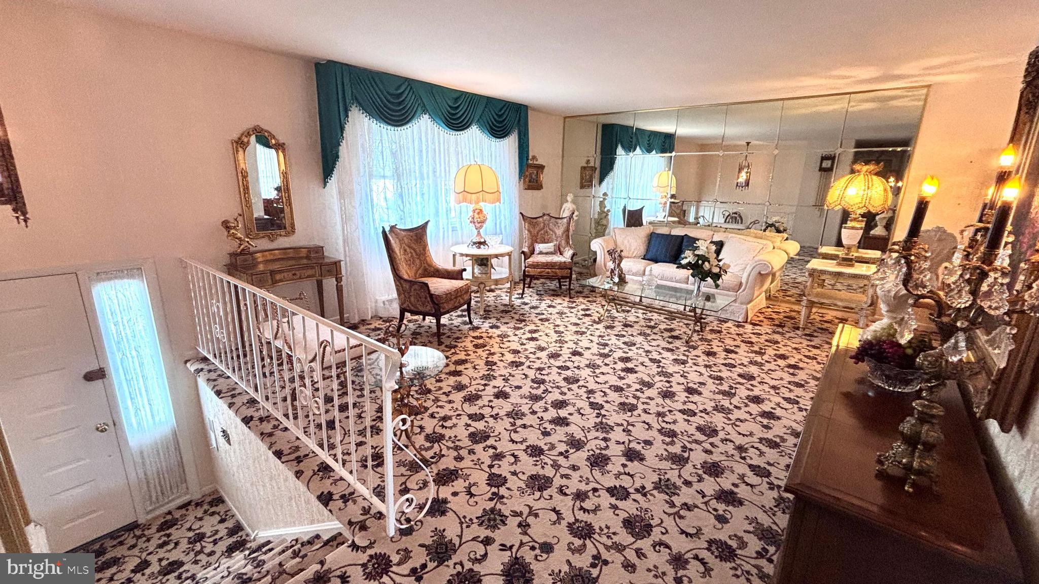 9401 Tulip Street Philadelphia, PA 19114 - Photo 7 of 67 a living room with furniture and a rug