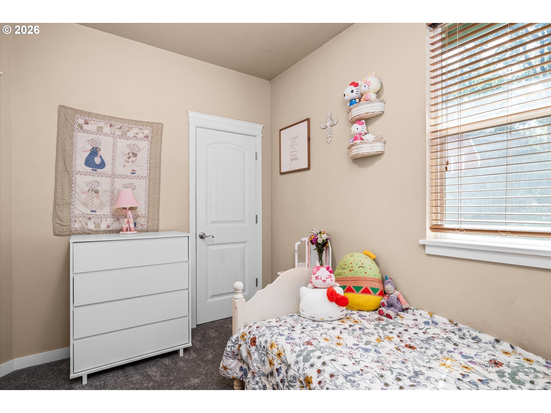 277 South 67th Court Springfield, OR 97478 - Photo 22 of 44 a bedroom with a bed and a dresser