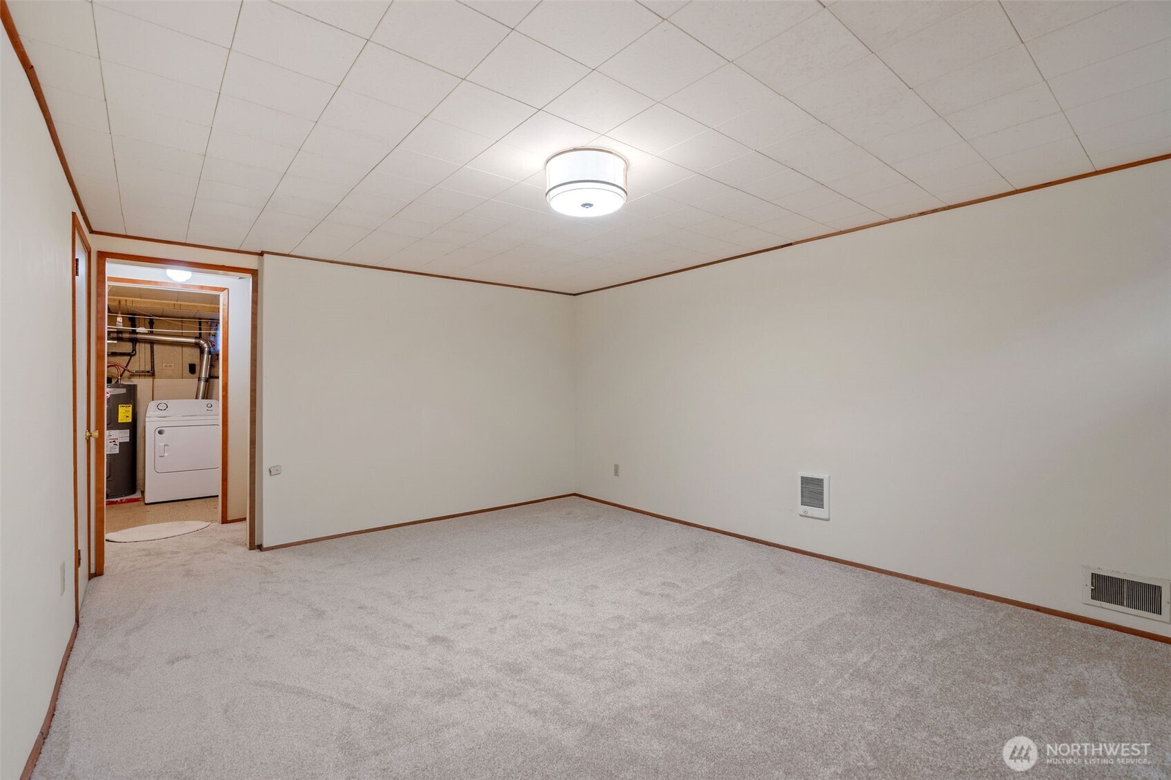 9748 Dayton Avenue North Seattle, WA 98103 - Photo 26 of 39 an empty room with closet