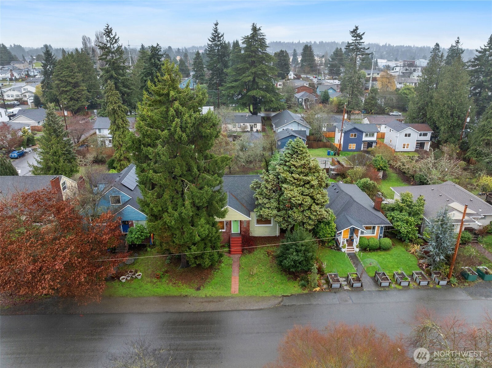 9748 Dayton Avenue North Seattle, WA 98103 - Photo 28 of 39 an aerial view of multiple house