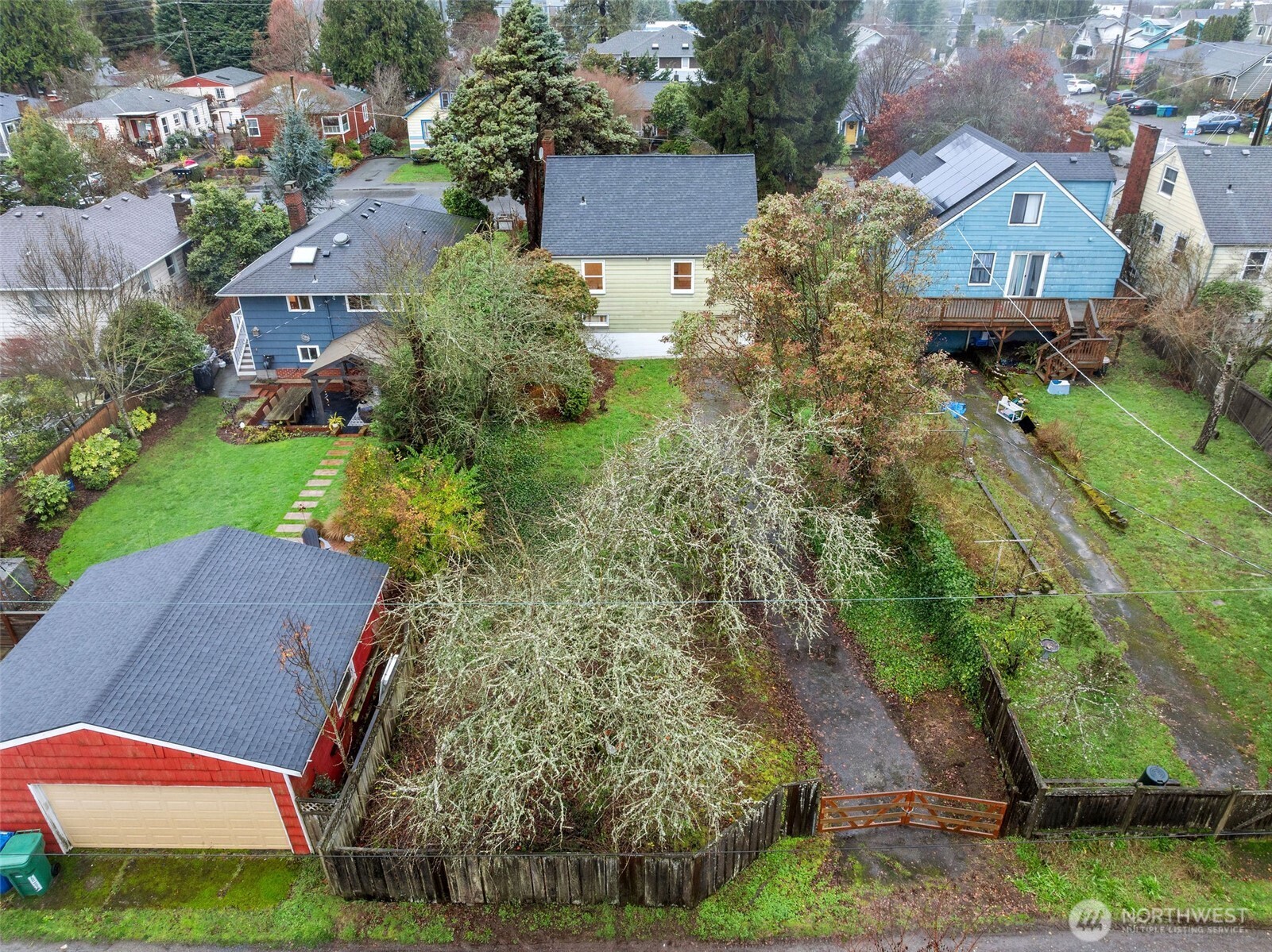 9748 Dayton Avenue North Seattle, WA 98103 - Photo 30 of 39 an aerial view of multiple houses with yard