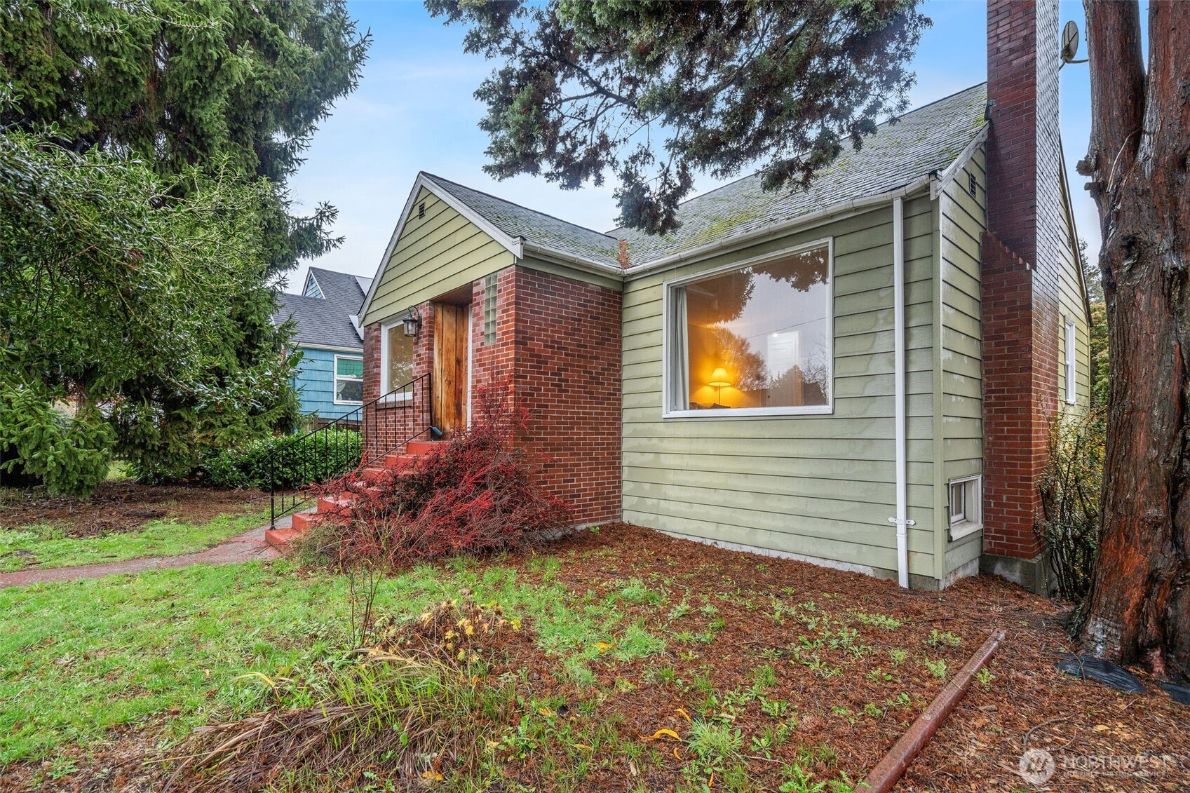 9748 Dayton Avenue North Seattle, WA 98103 - Photo 34 of 39 a view of a house with a yard