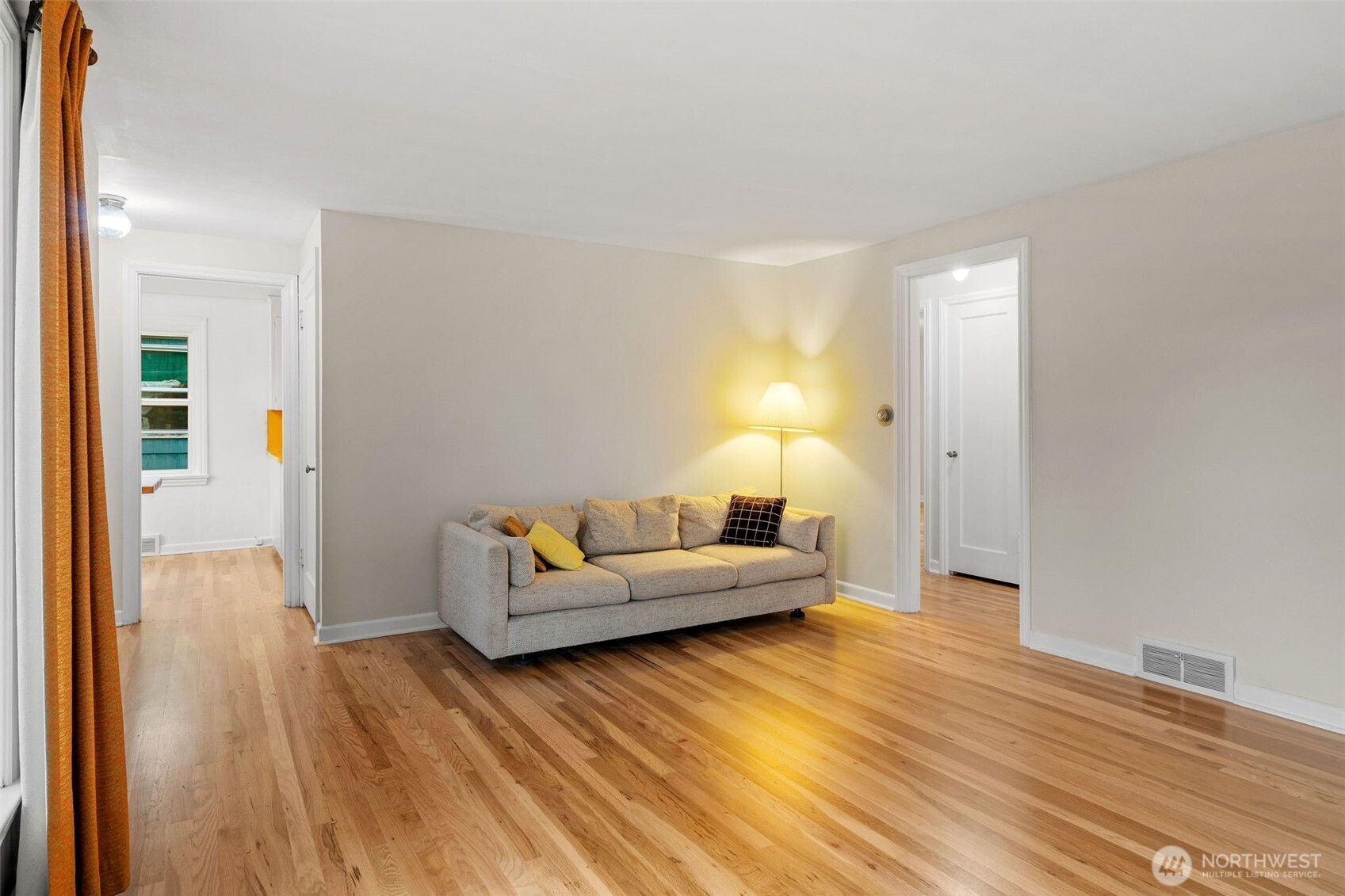 9748 Dayton Avenue North Seattle, WA 98103 - Photo 6 of 39 a living room with furniture and a wooden floor