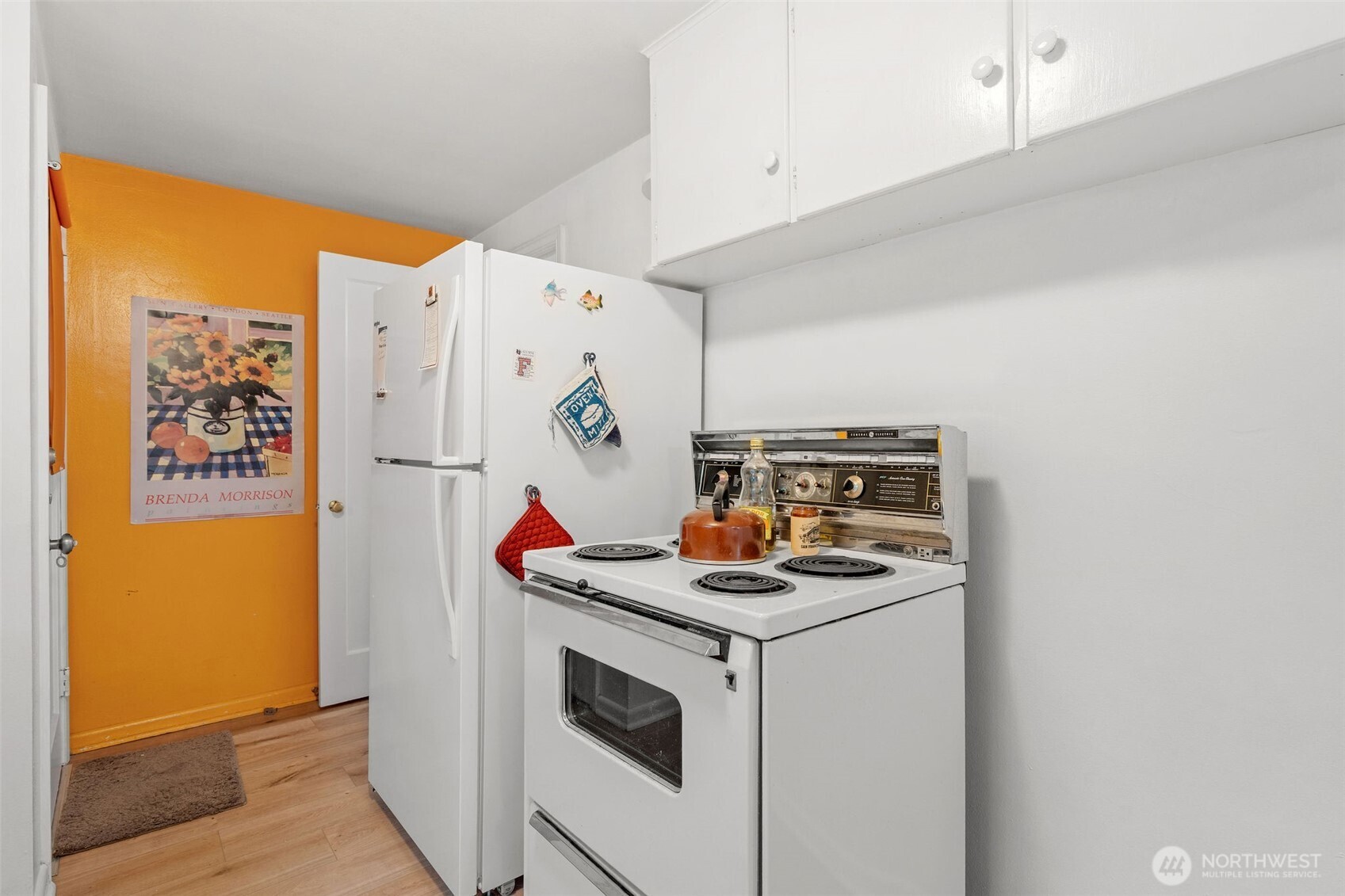 9748 Dayton Avenue North Seattle, WA 98103 - Photo 9 of 39 a utility room with dryer and washer