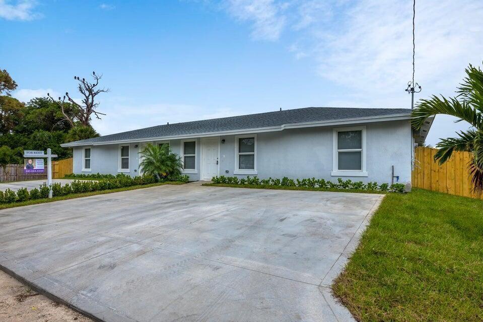 5173 Clouse Road West Palm Beach, FL 33417 - Photo 1 of 25 26-43-42, N 130 FT OF S 660 FT OF W 100