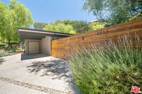 a view of an outdoor space with a patio