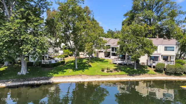a view of a lake with a building in the background