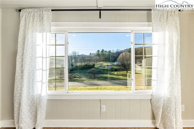 a view of swimming pool from a window