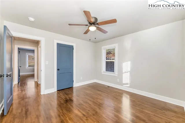 a view of an empty room and window