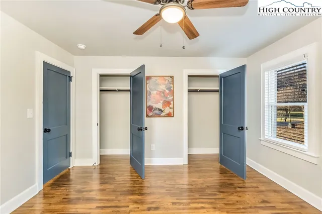 a view of a livingroom with wooden floor