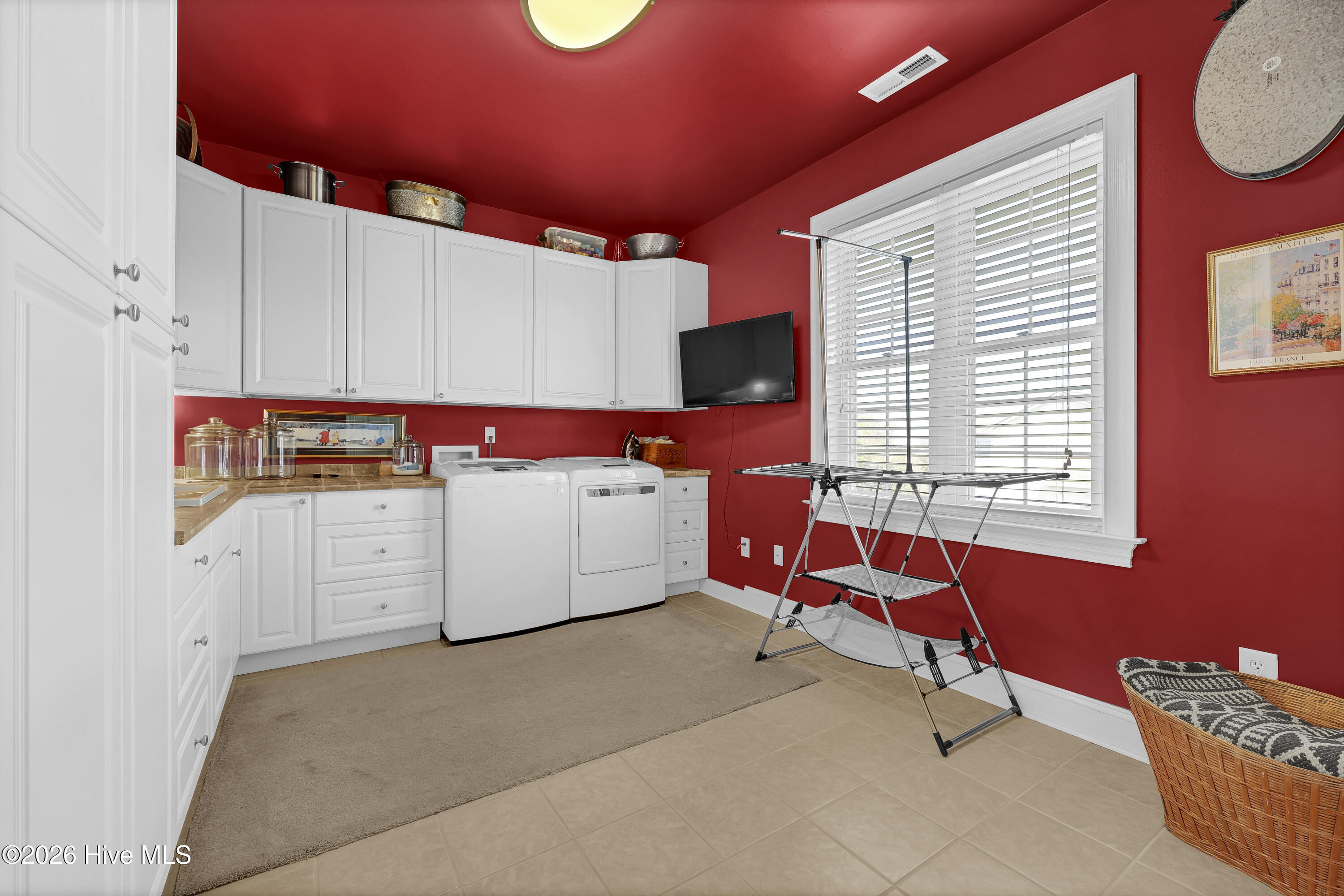10 W Ridge Surf City, NC 28445 - Photo 27 of 86 laundry room tv & window