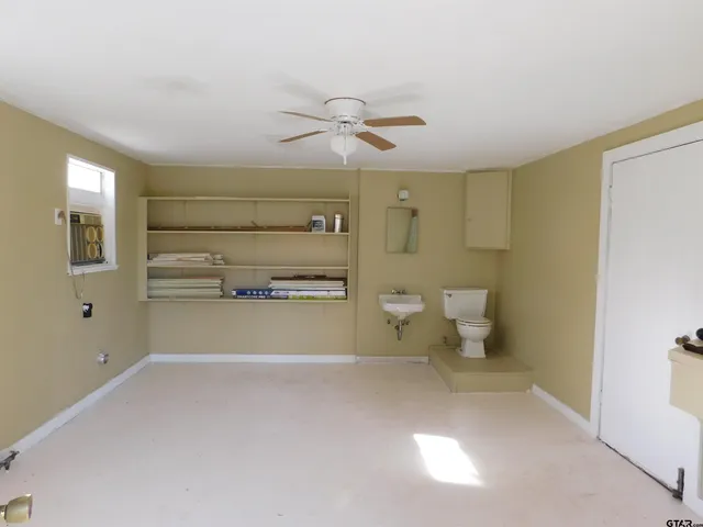 a view of a toilet in a room