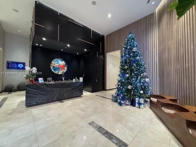 a living room with a christmas tree