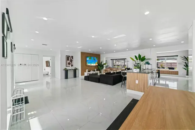 a living room with furniture and a table