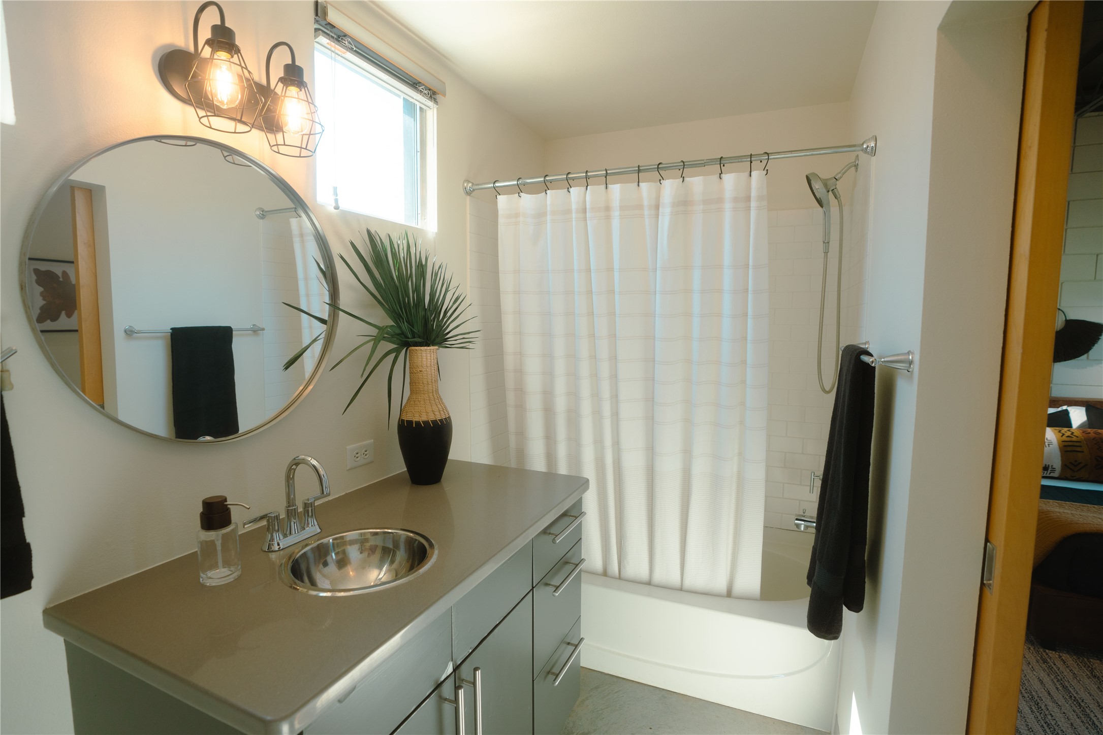 4801 South Congress Avenue, Unit H5 Austin, TX 78745 - Photo 22 of 39 Full bathroom featuring vanity and shower / tub combo with curtain