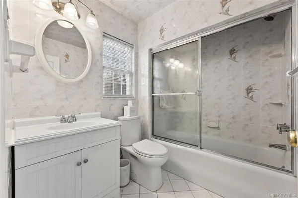 a bathroom with a toilet and a sink