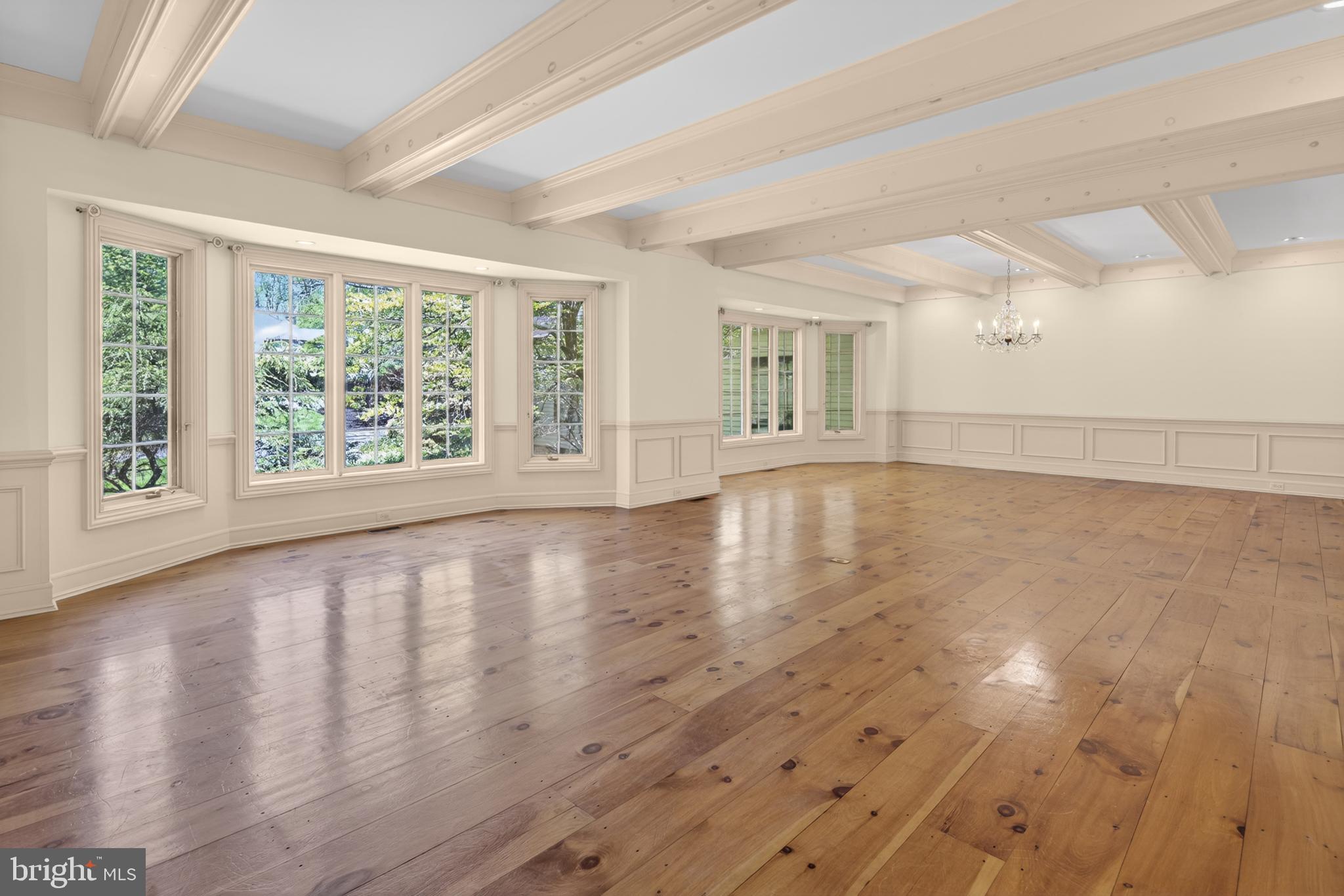 255 Arreton Road Princeton, NJ 08540 - Photo 11 of 65 wooden floor in an empty room with a window