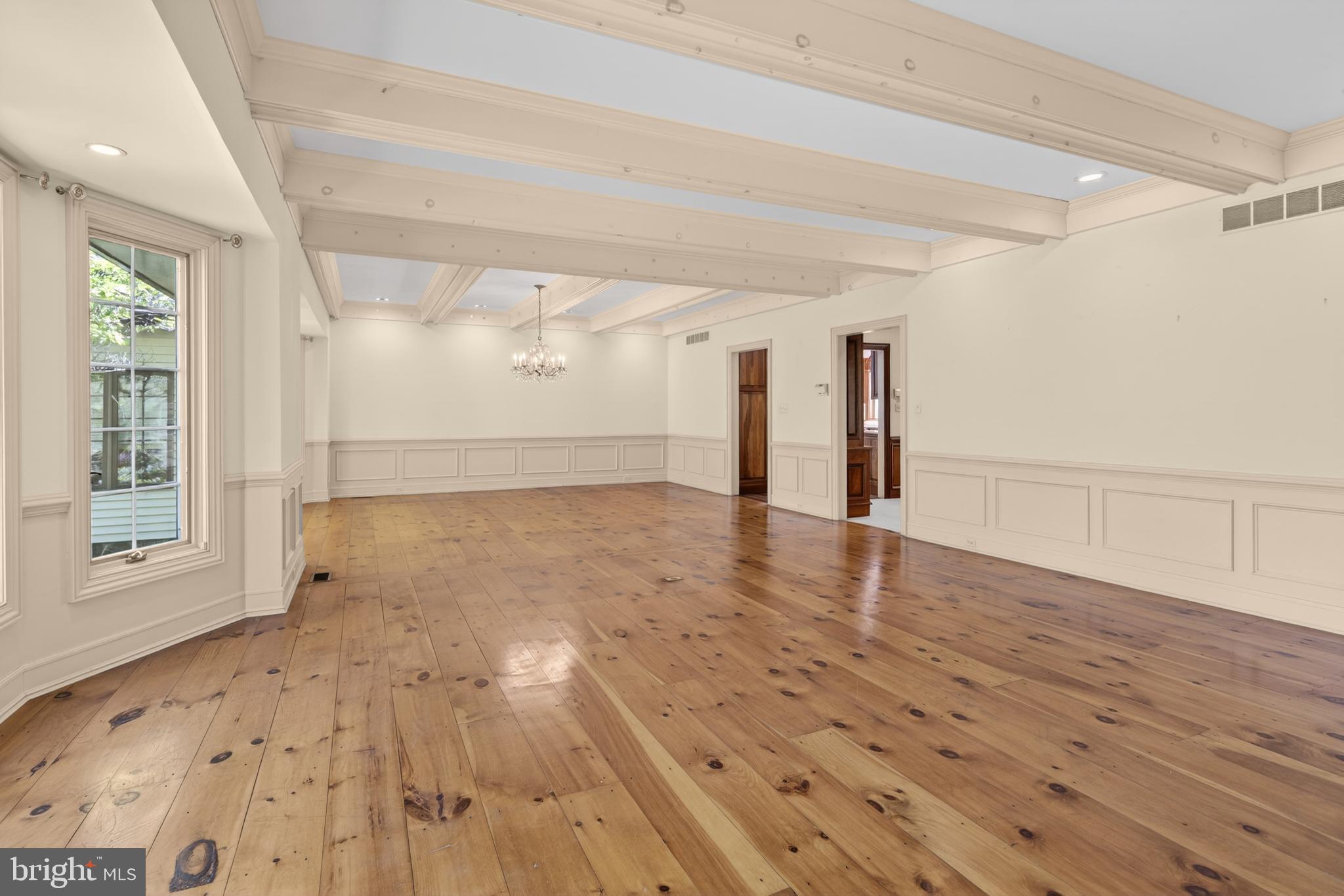 255 Arreton Road Princeton, NJ 08540 - Photo 14 of 65 a view of empty room with wooden floor and fan