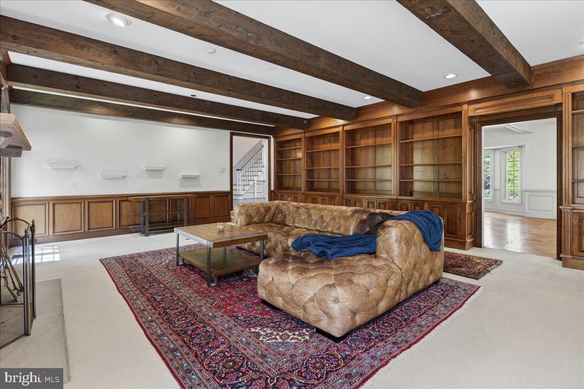 255 Arreton Road Princeton, NJ 08540 - Photo 17 of 65 a living room with furniture and a rug