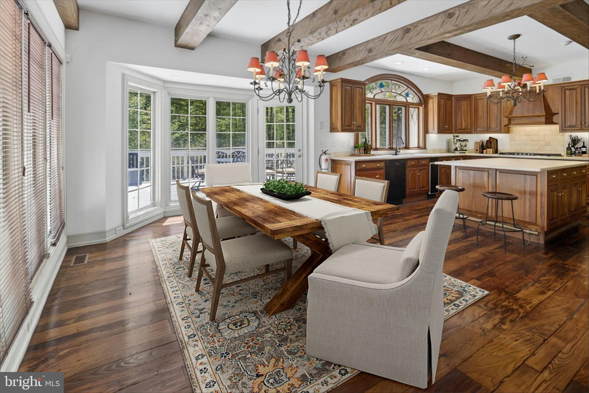 255 Arreton Road Princeton, NJ 08540 - Photo 21 of 65 a view of a dining room with furniture window and wooden floor