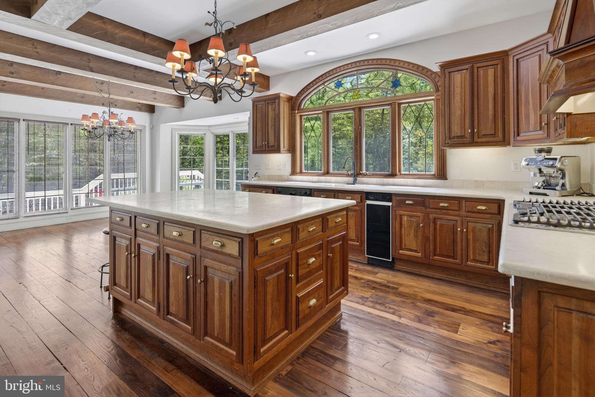 255 Arreton Road Princeton, NJ 08540 - Photo 24 of 65 a kitchen with stainless steel appliances granite countertop a stove and a large cabinets