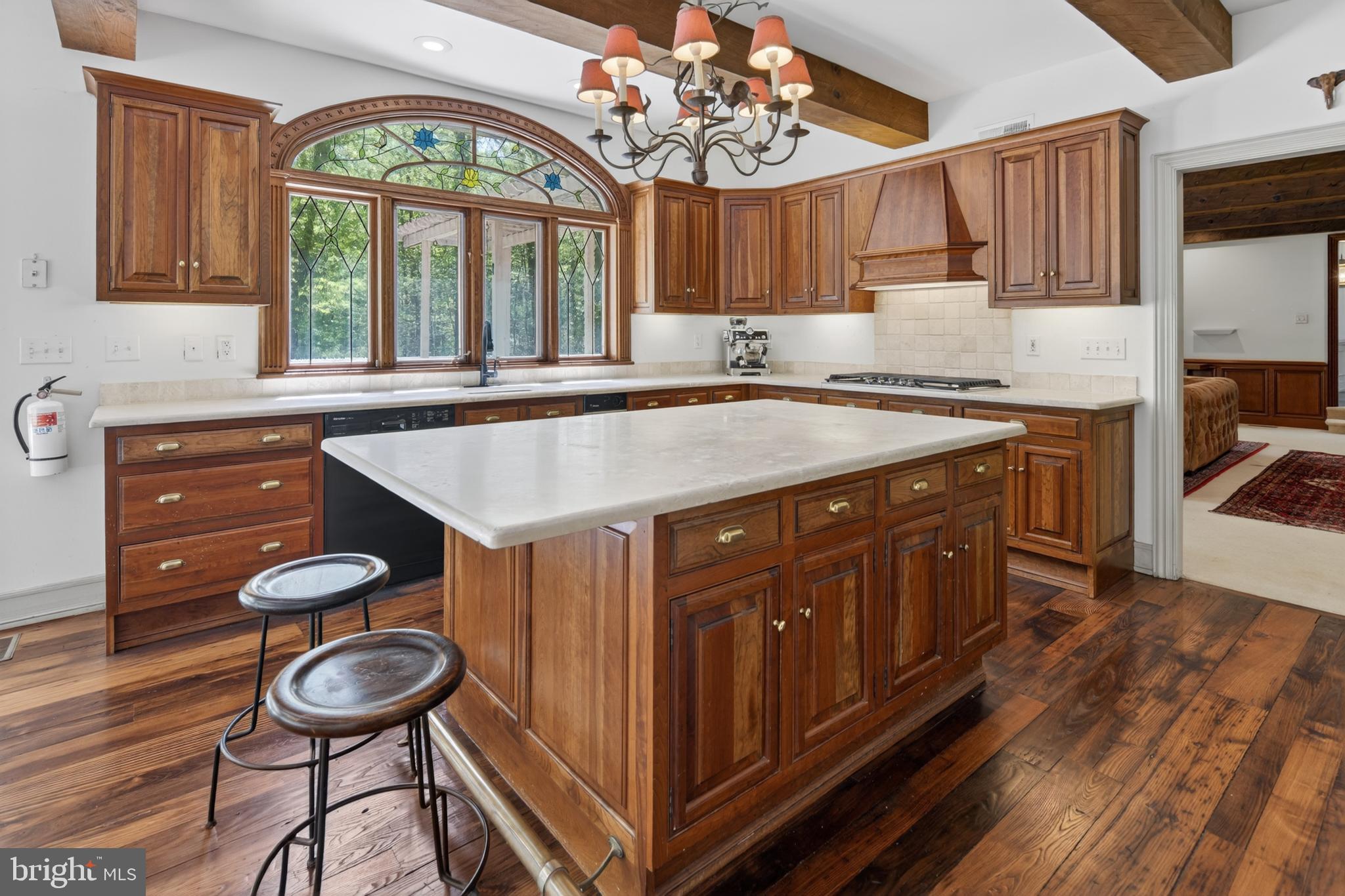 255 Arreton Road Princeton, NJ 08540 - Photo 27 of 65 a kitchen with stainless steel appliances granite countertop a stove a sink and a cabinets