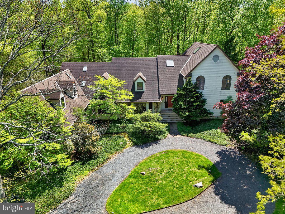 255 Arreton Road Princeton, NJ 08540 - Photo 3 of 65 a view of a house with a backyard