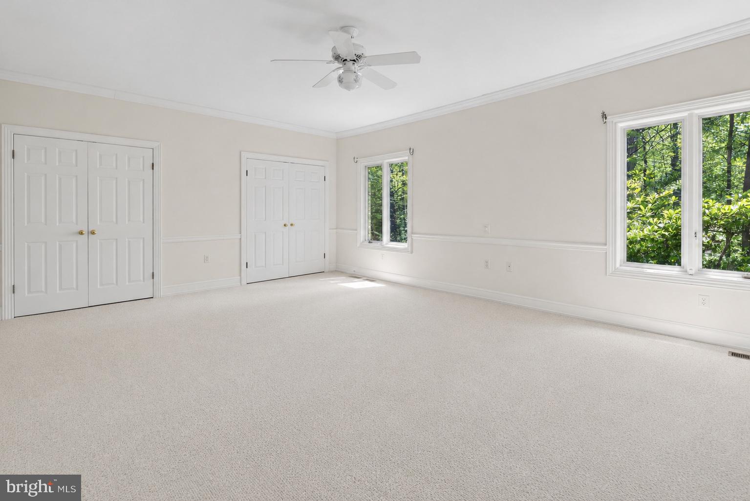 255 Arreton Road Princeton, NJ 08540 - Photo 44 of 65 a view of a livingroom with a ceiling fan and window