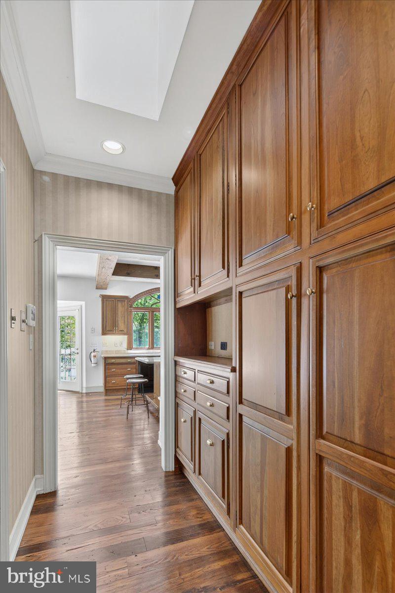 255 Arreton Road Princeton, NJ 08540 - Photo 49 of 65 a kitchen with stainless steel appliances granite countertop a refrigerator a stove and a wooden floors