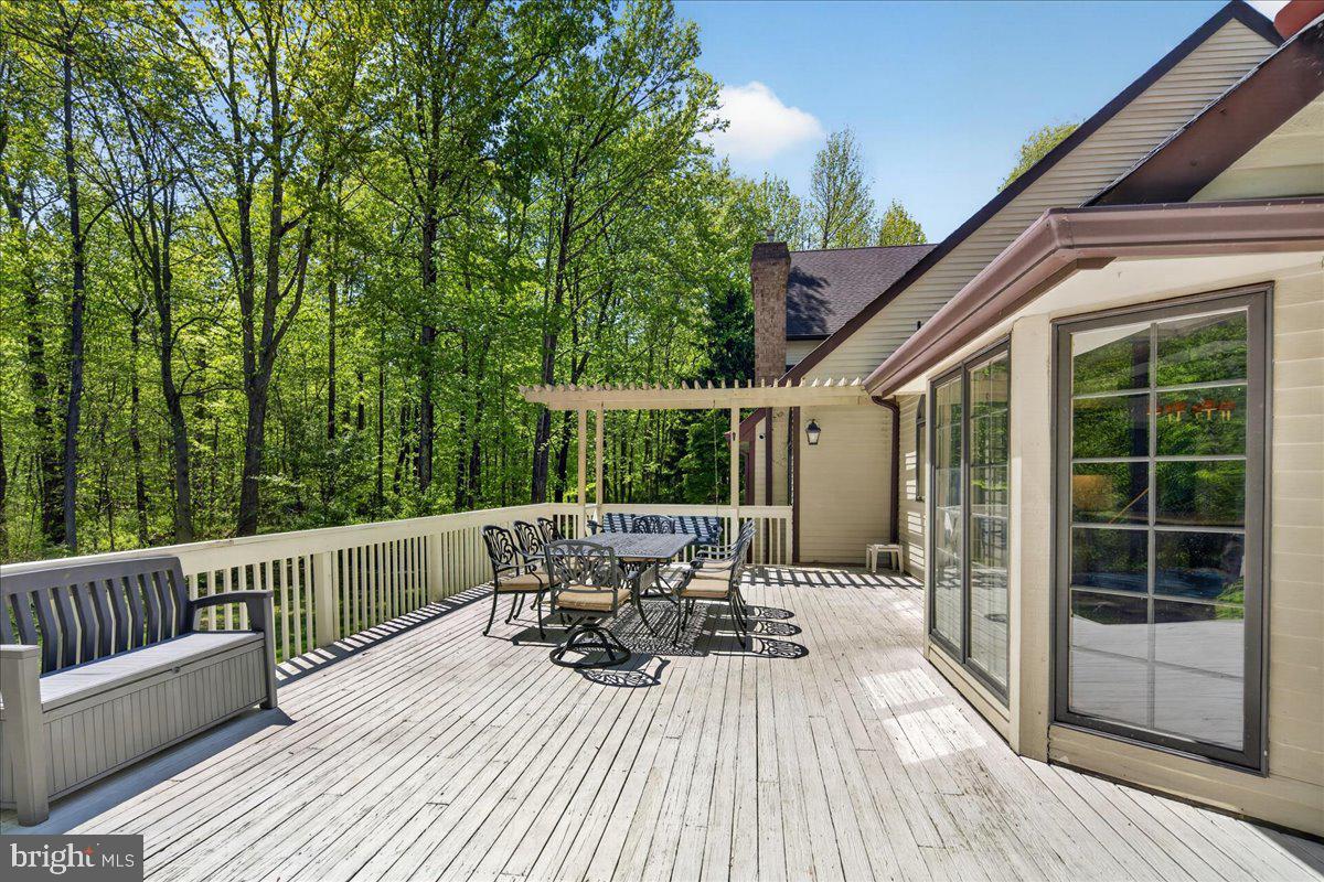 255 Arreton Road Princeton, NJ 08540 - Photo 54 of 65 a view of balcony with furniture and wooden floor