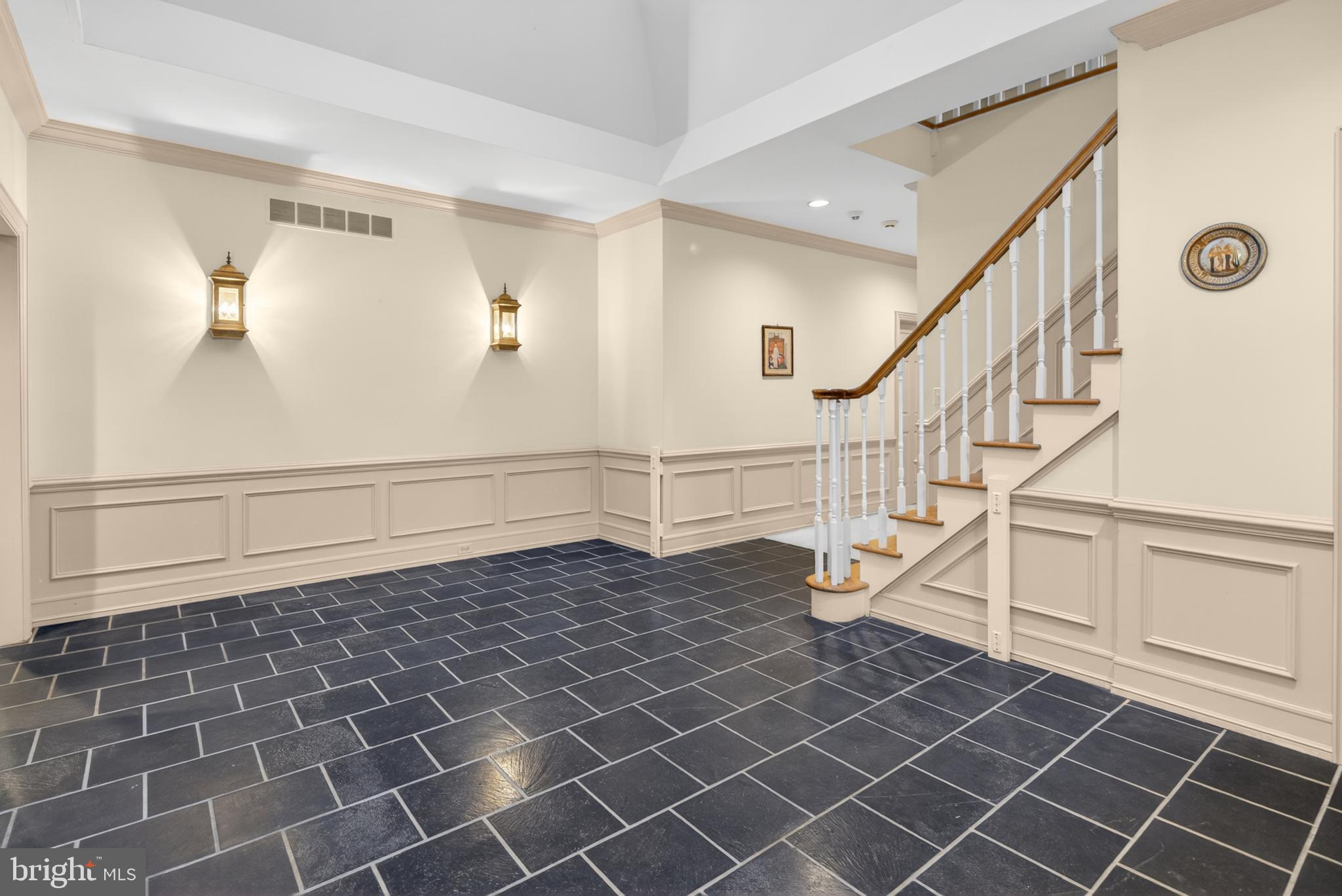 255 Arreton Road Princeton, NJ 08540 - Photo 9 of 65 a view of entryway with wooden floor and stairs