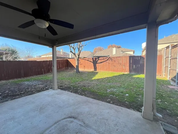 a view of a backyard with garden