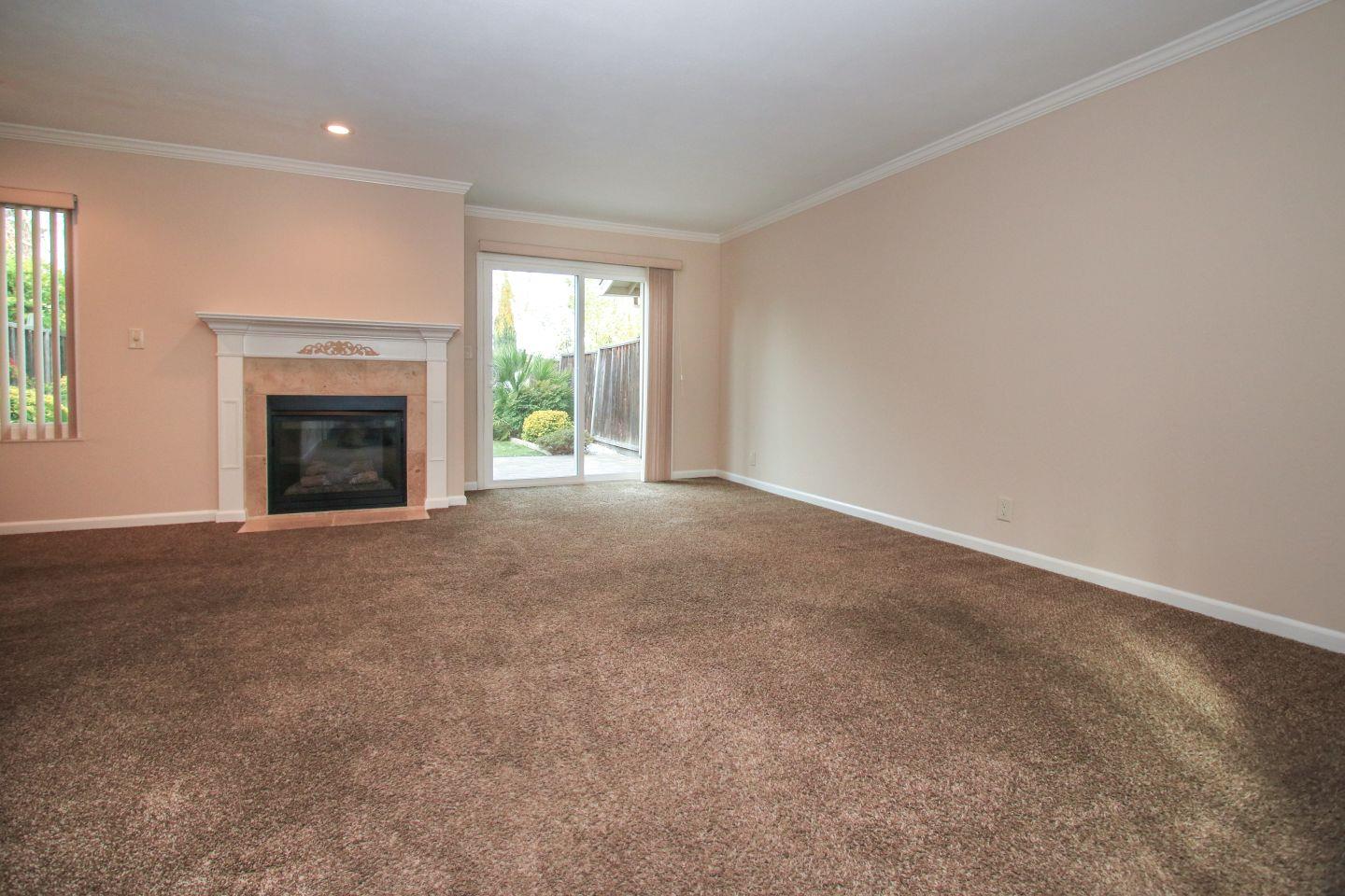 837 Spruance Lane Foster City, CA 94404 - Photo 3 of 32 a view of empty room with a fireplace