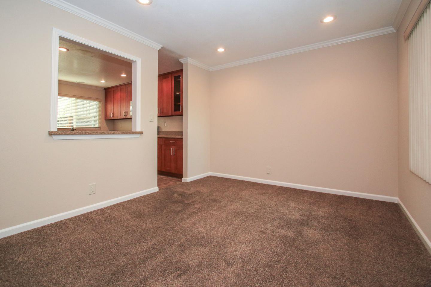 837 Spruance Lane Foster City, CA 94404 - Photo 6 of 32 an empty room with a empty space and windows