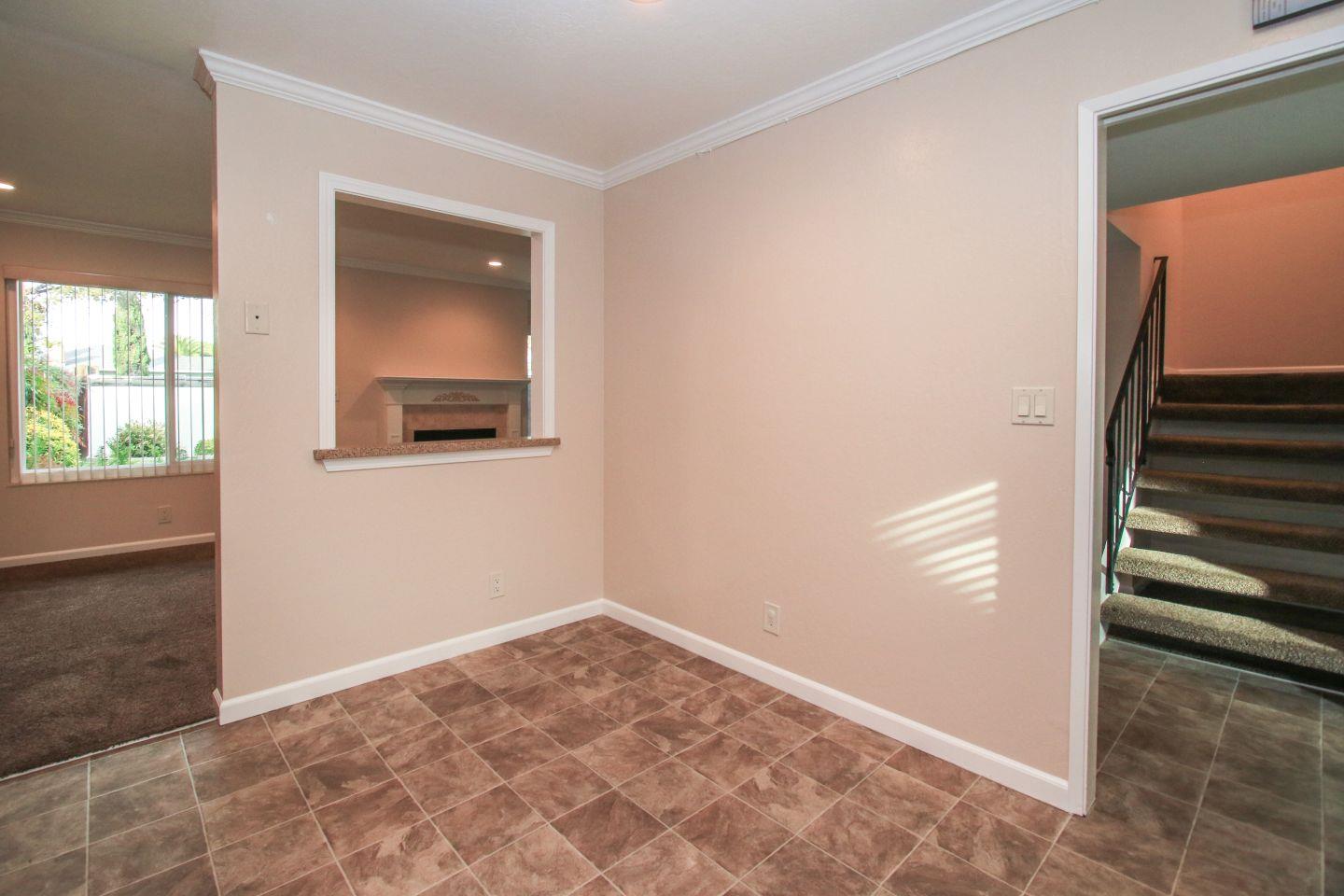 837 Spruance Lane Foster City, CA 94404 - Photo 9 of 32 an empty room with windows