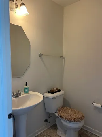 a bathroom with a sink and a toilet
