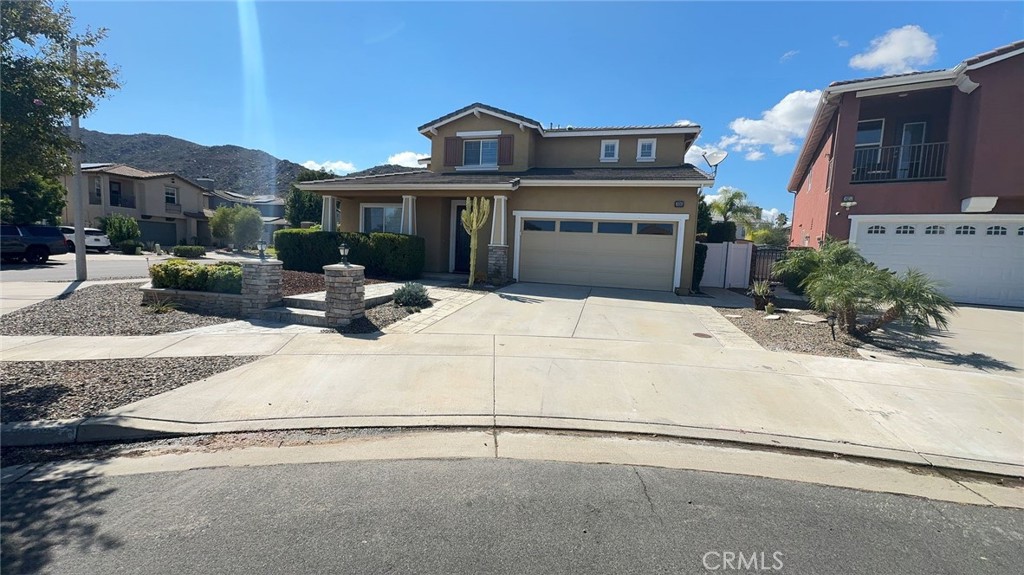 38265 Birch Court Murrieta, CA 92562 - Photo 2 of 46 a front view of a house with a garden