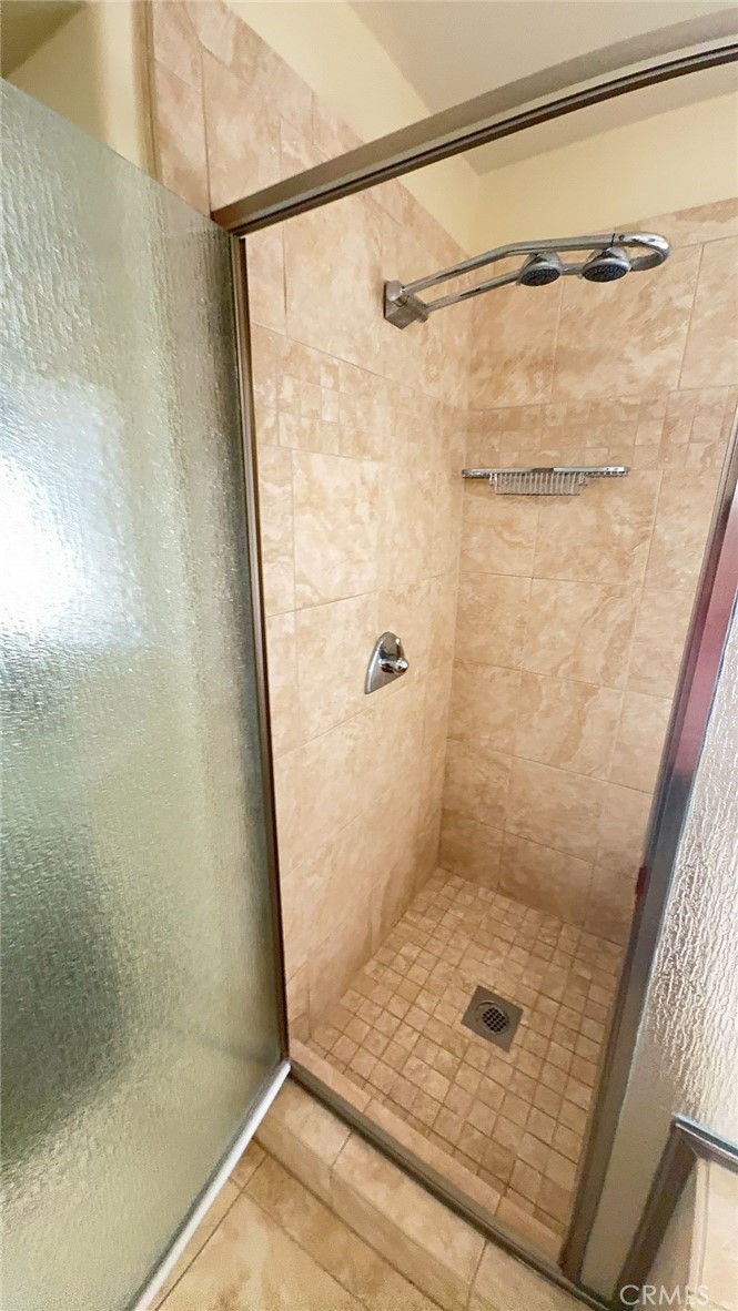 38265 Birch Court Murrieta, CA 92562 - Photo 26 of 46 a bathroom with a shower