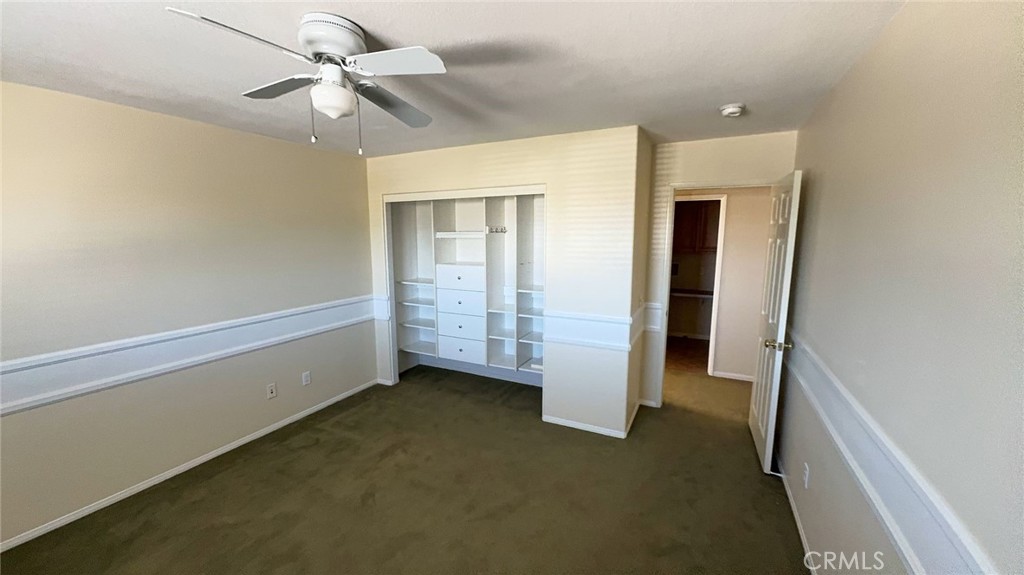 38265 Birch Court Murrieta, CA 92562 - Photo 27 of 46 en empty room with closet and fan