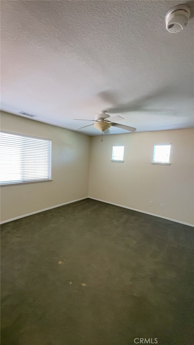 38265 Birch Court Murrieta, CA 92562 - Photo 34 of 46 an empty room with a empty space and a window