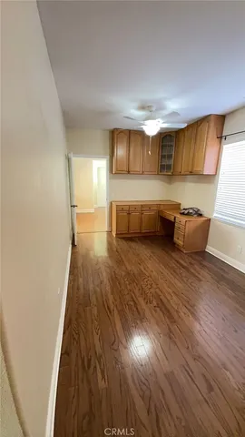 a kitchen with a cabinets and white sink
