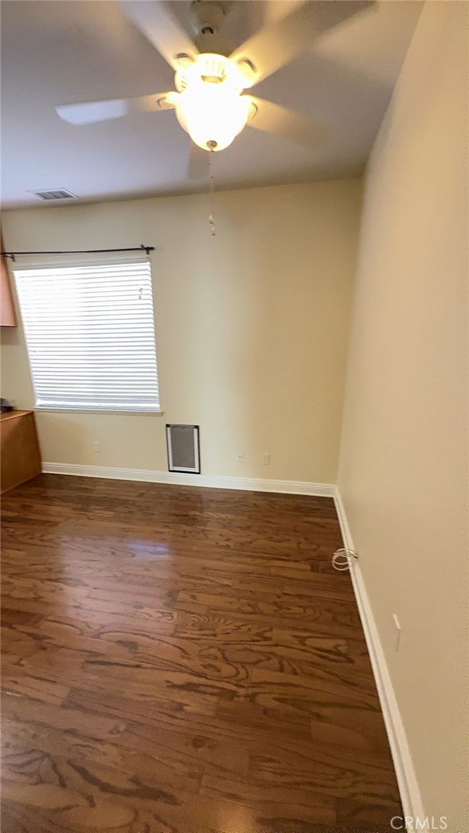 38265 Birch Court Murrieta, CA 92562 - Photo 38 of 46 a view of room with window and wooden floor
