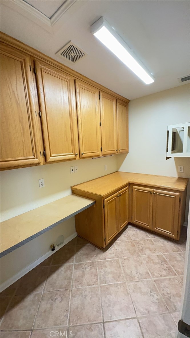 38265 Birch Court Murrieta, CA 92562 - Photo 39 of 46 a kitchen with a cabinets and white sink