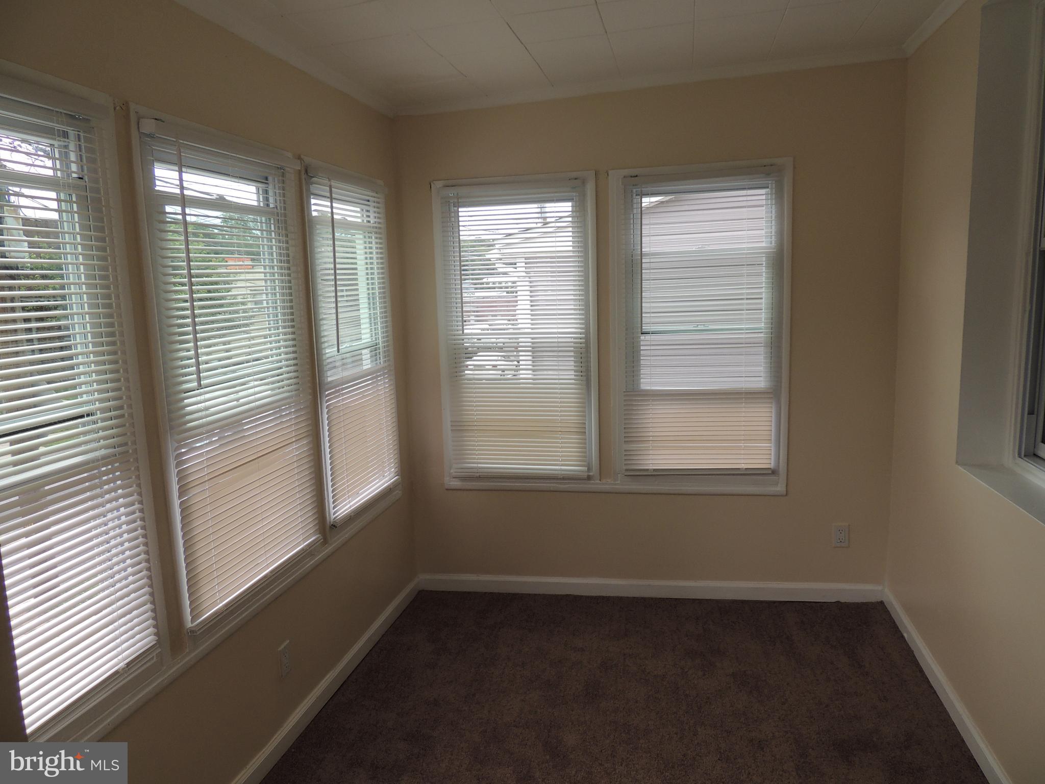 119 Rhodes Avenue Collingdale, PA 19023 - Photo 15 of 34 Enclosed front porch