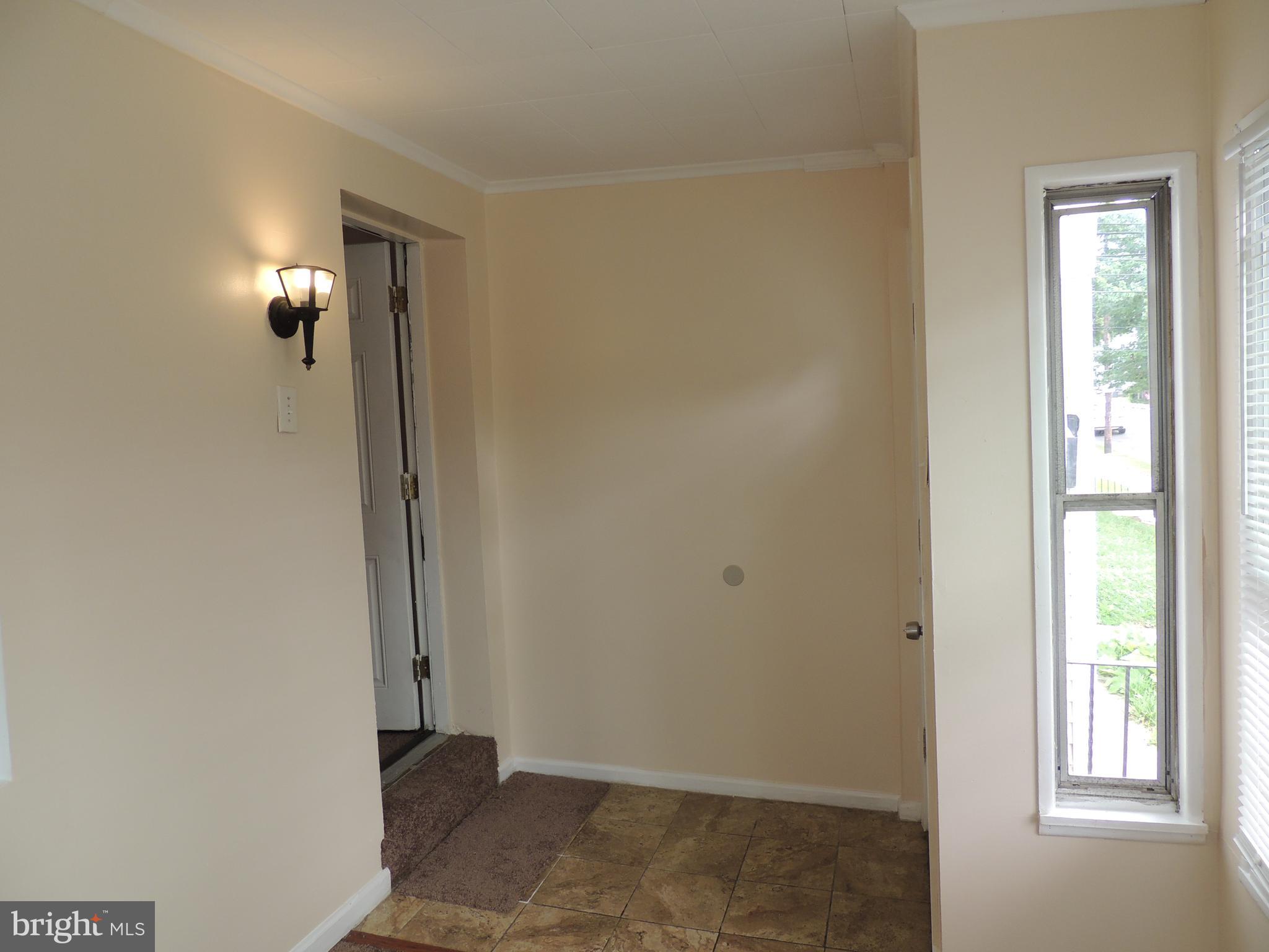 119 Rhodes Avenue Collingdale, PA 19023 - Photo 16 of 34 Enclosed front porch