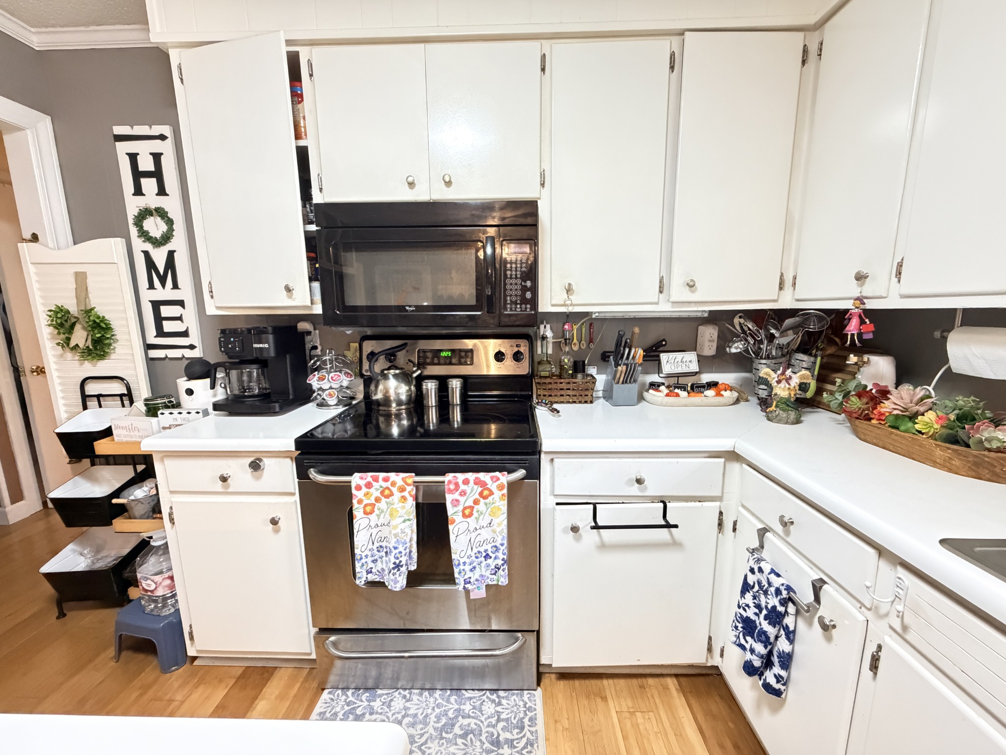 2890 Nance Bend Road Clifton, TN 38425 - Photo 16 of 52 a kitchen with stainless steel appliances a stove a sink and a refrigerator